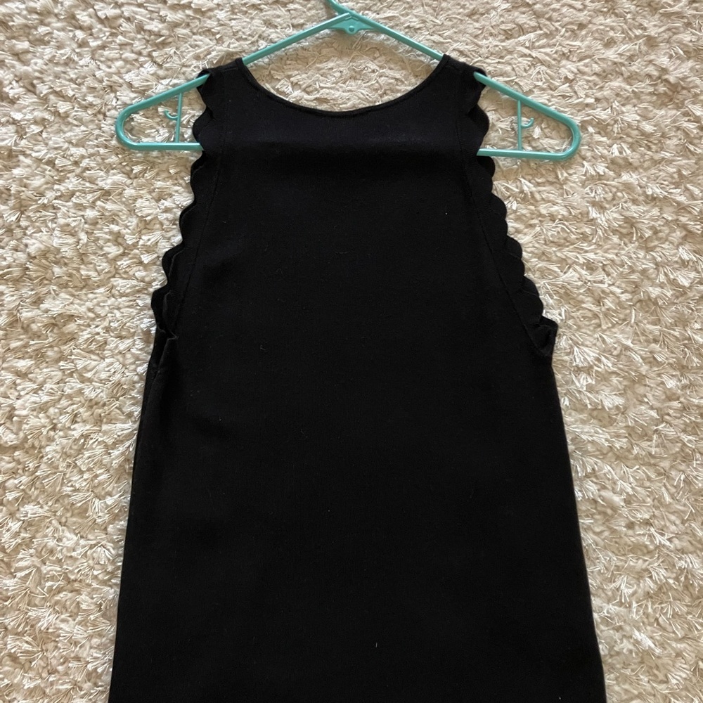 Black Sleeveless Top with Scalloped Edges